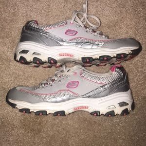 Women’s gray, pink, and white Skechers